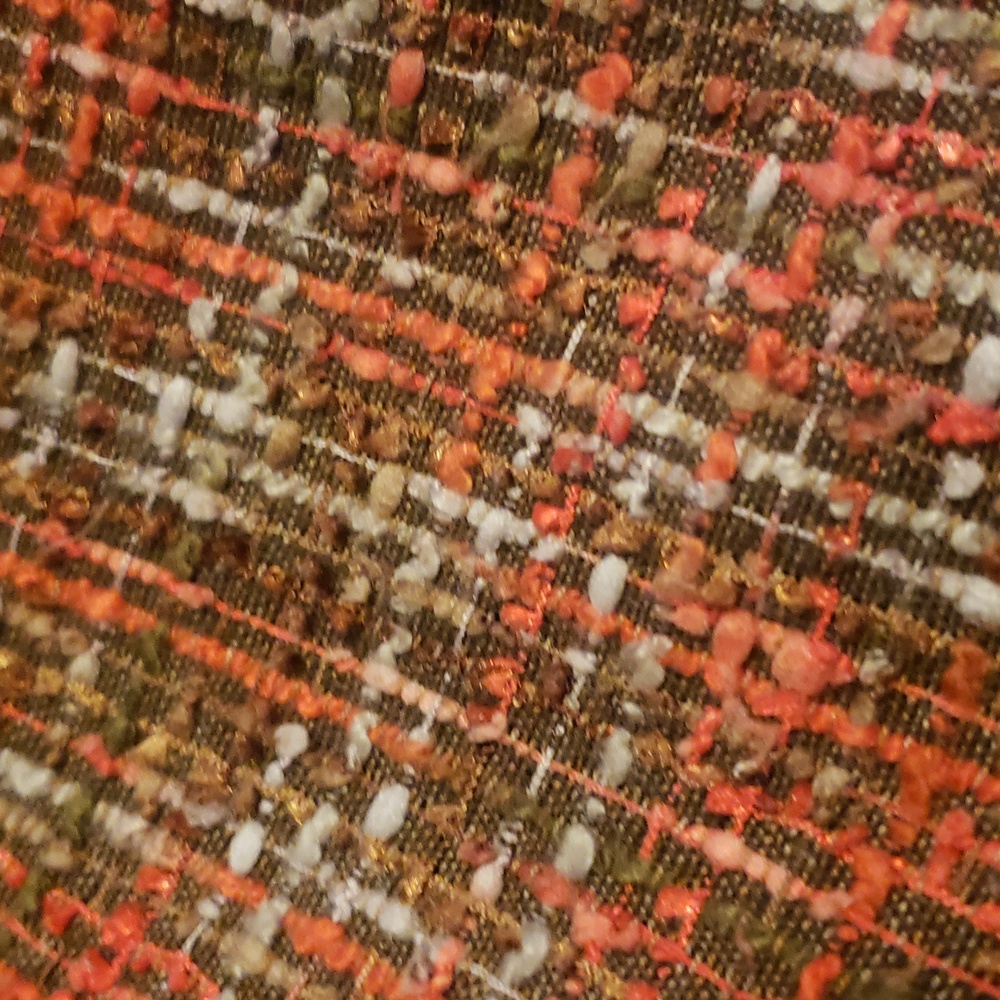 Soft boucle tweed skirt for fall looks.